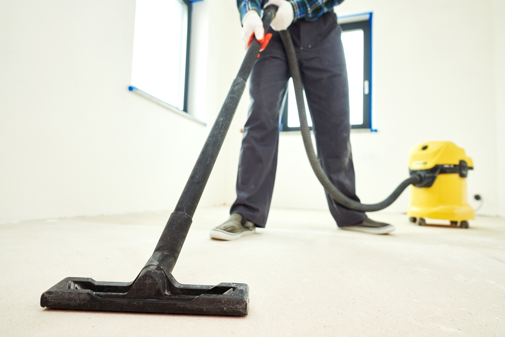 construction,cleaning,service.,dust,removal,with,vacuum,cleaner